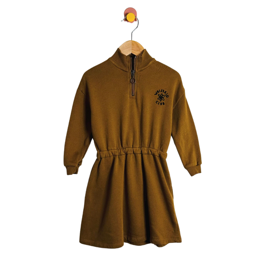 Brown dress with a logo on a hanger against a white background