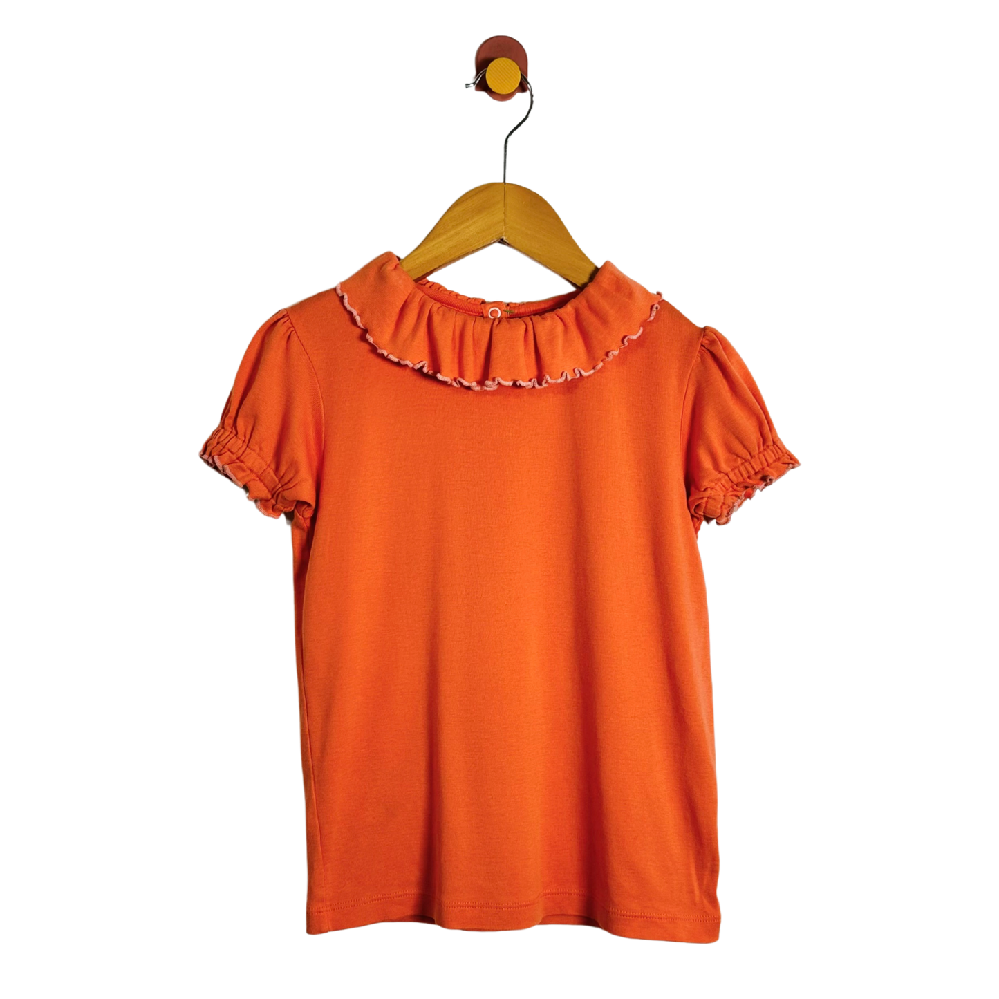 An orange short-sleeve blouse with a ruffled collar and puff sleeves, hanging on a wooden hanger against a plain white background.