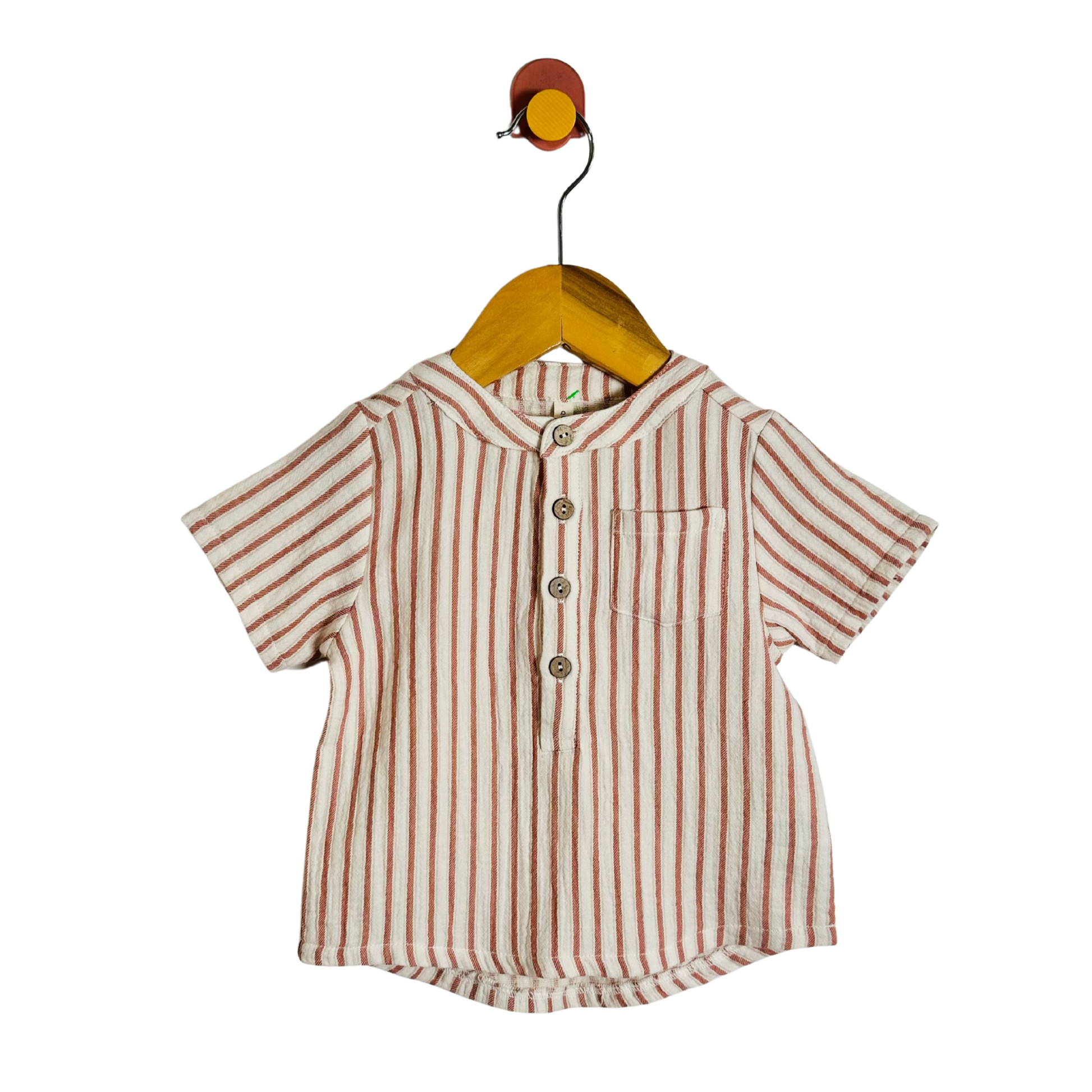 A short-sleeve button-front shirt with vertical red stripes on a cream base, hanging on a wooden hanger against a plain white background.