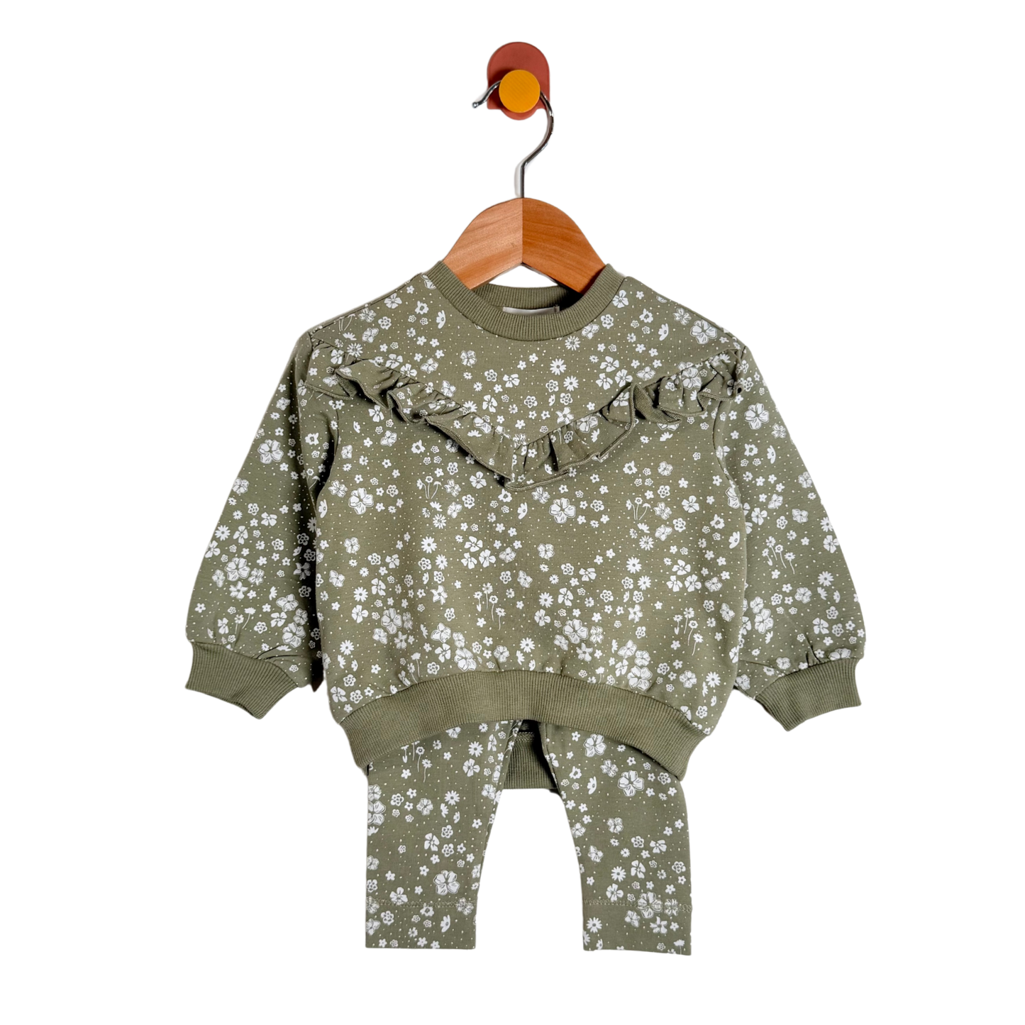 A toddler's two-piece sweatshirt and pants set in olive green with a white floral print, hanging on a wooden hanger against a plain white background.