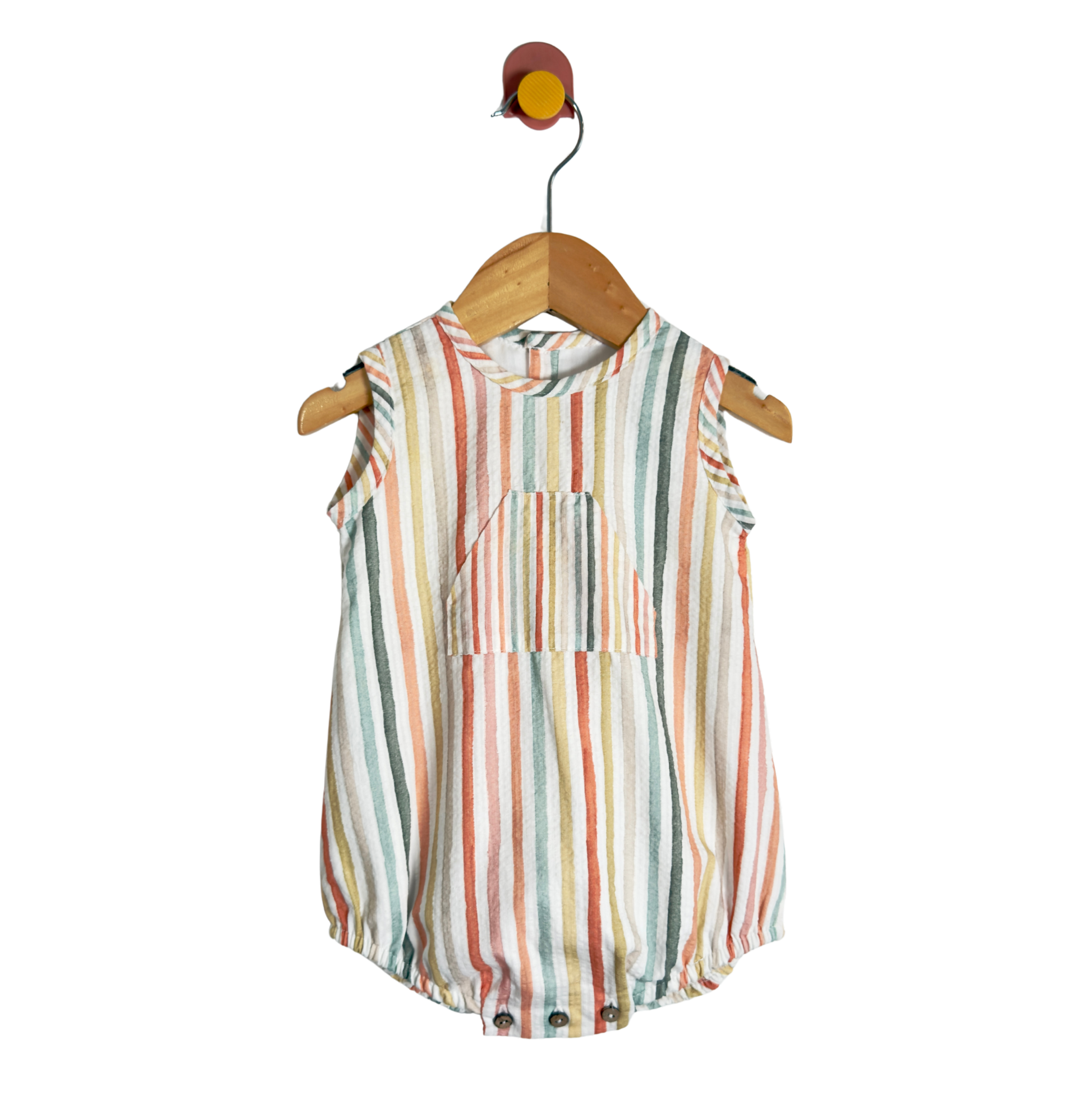 A sleeveless baby romper with vertical multicolor stripes in orange, green, blue, and pink on an off-white base, hanging on a wooden hanger against a plain white background.