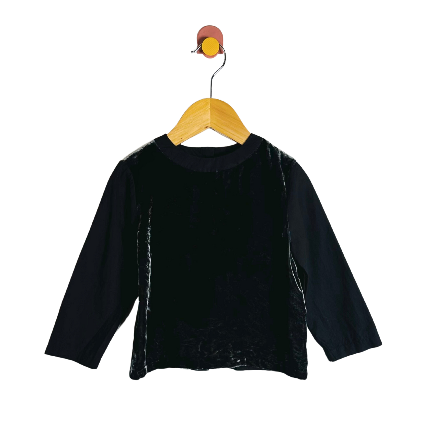 Black long-sleeve shirt on a wooden hanger against a white background