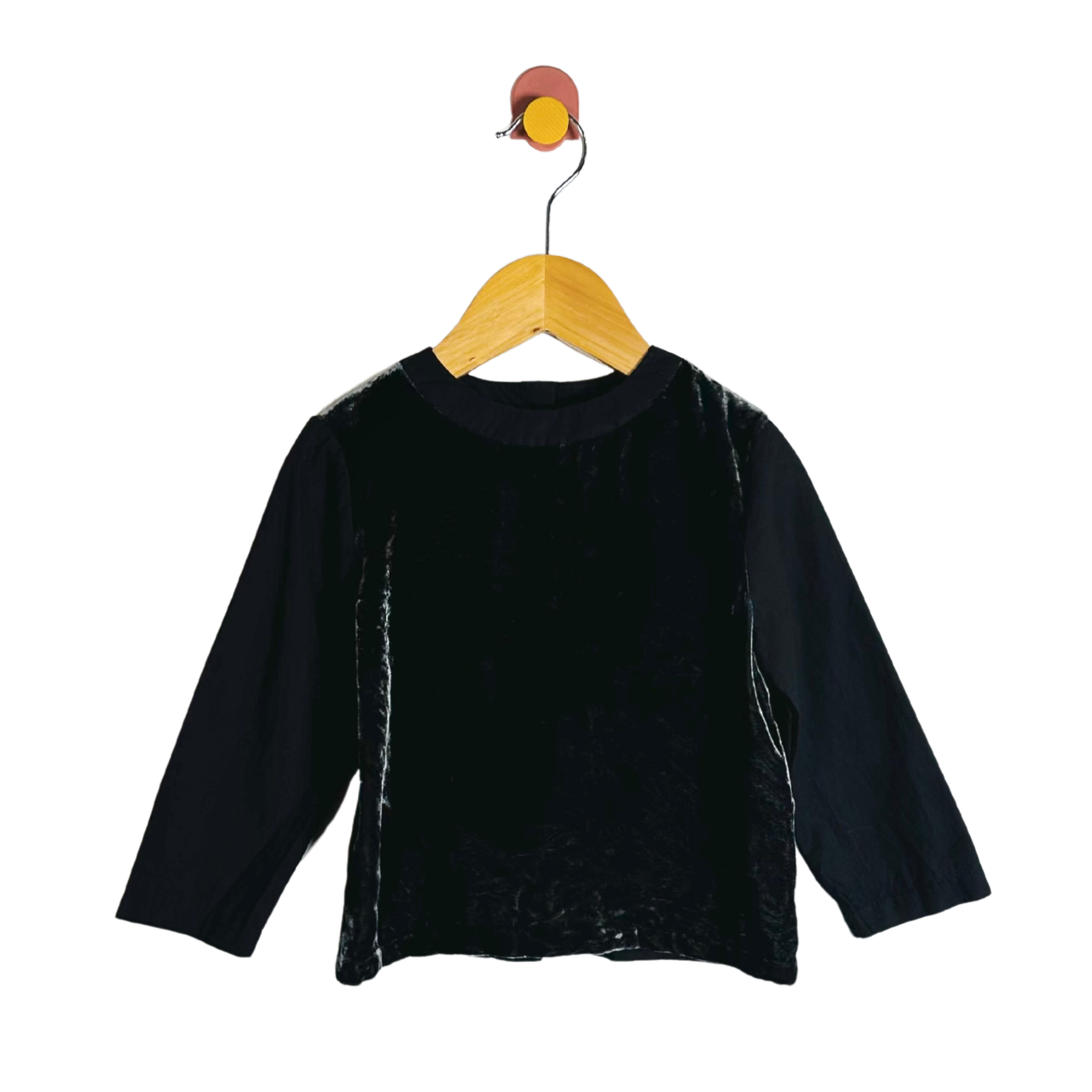 Black long-sleeve shirt on a wooden hanger against a white background