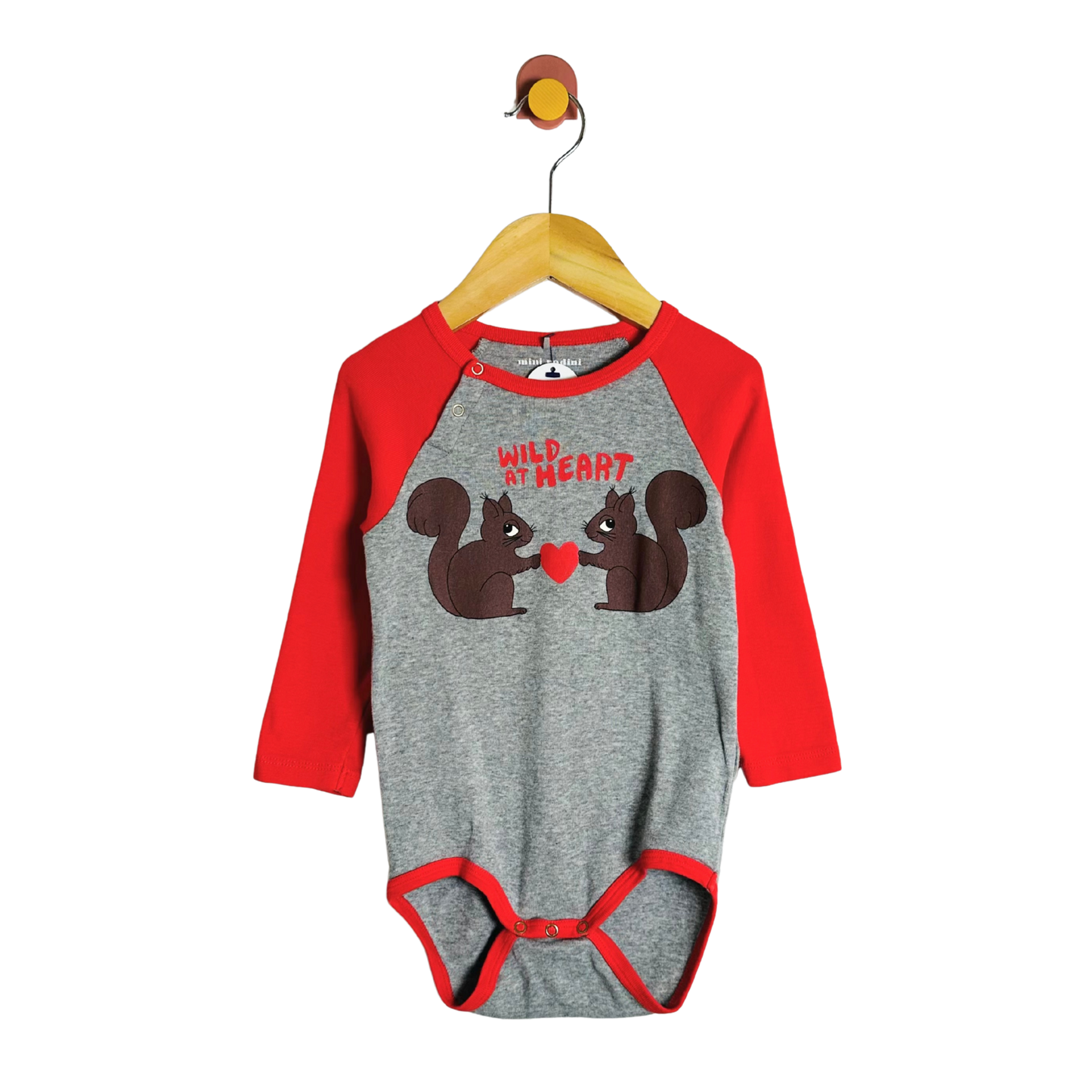 Gray and red baby onesie with squirrel design on a hanger against a white background