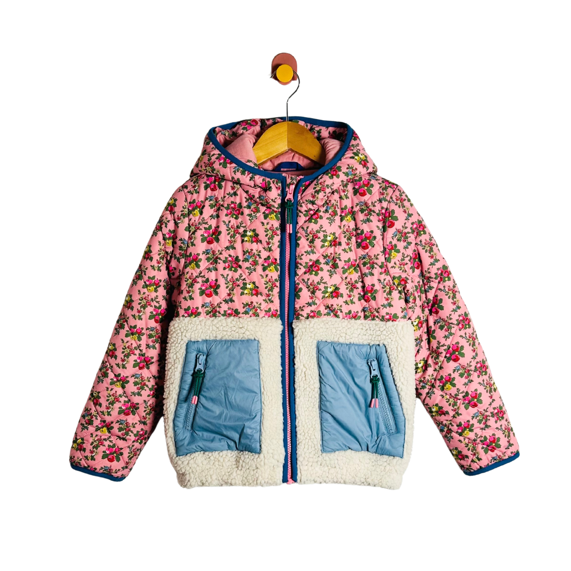 Pink floral jacket with blue accents on a white background