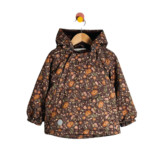 Floral-patterned jacket on a hanger against a white background