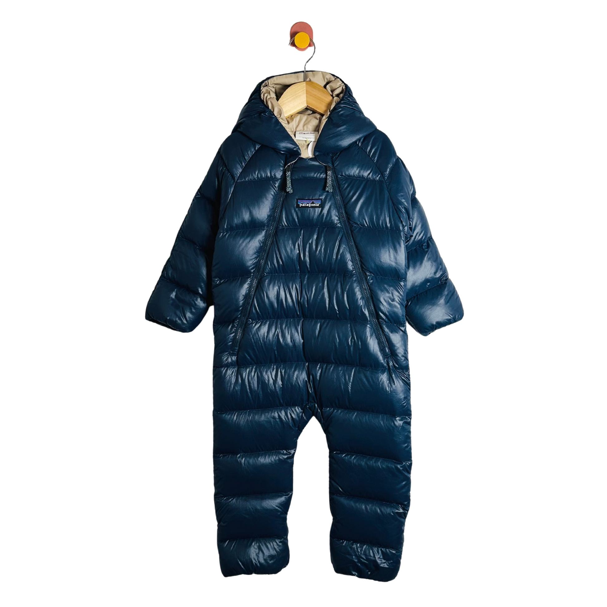 Blue baby snowsuit on a white background