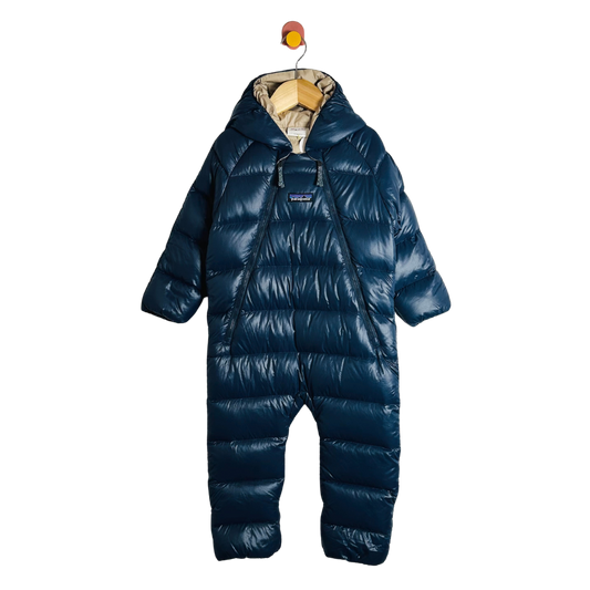 Blue baby snowsuit on a white background
