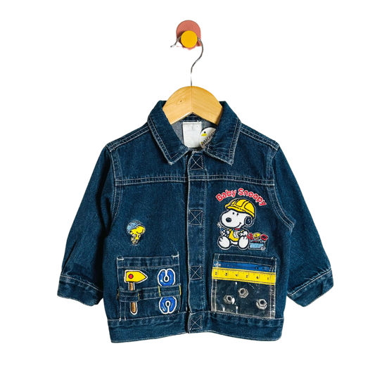 Children's denim jacket with cartoon character design on a hanger against a white background
