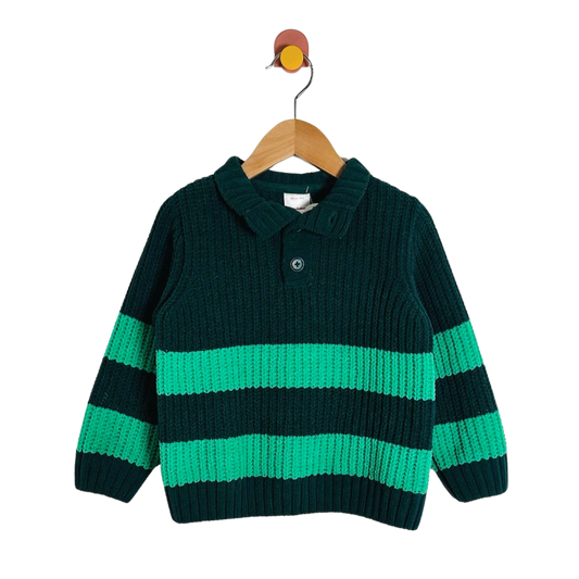 A baby knit polo sweater with horizontal stripes in dark forest green and bright green, hanging on a wooden hanger against a plain white background.