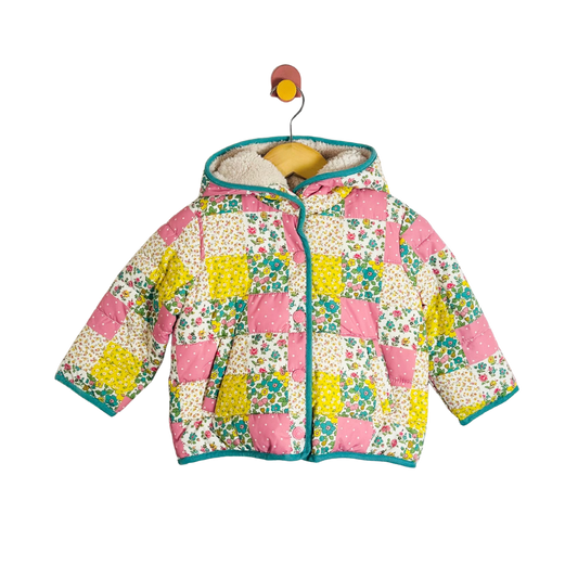 Floral quilted jacket on a white background