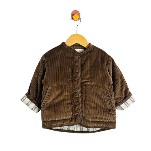 Brown corduroy jacket on a hanger against a white background