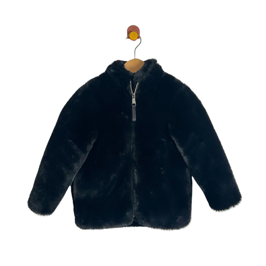 A black faux fur zip-up jacket with a hood, hanging on a wooden hanger with a small bird-shaped hook against a plain white background.