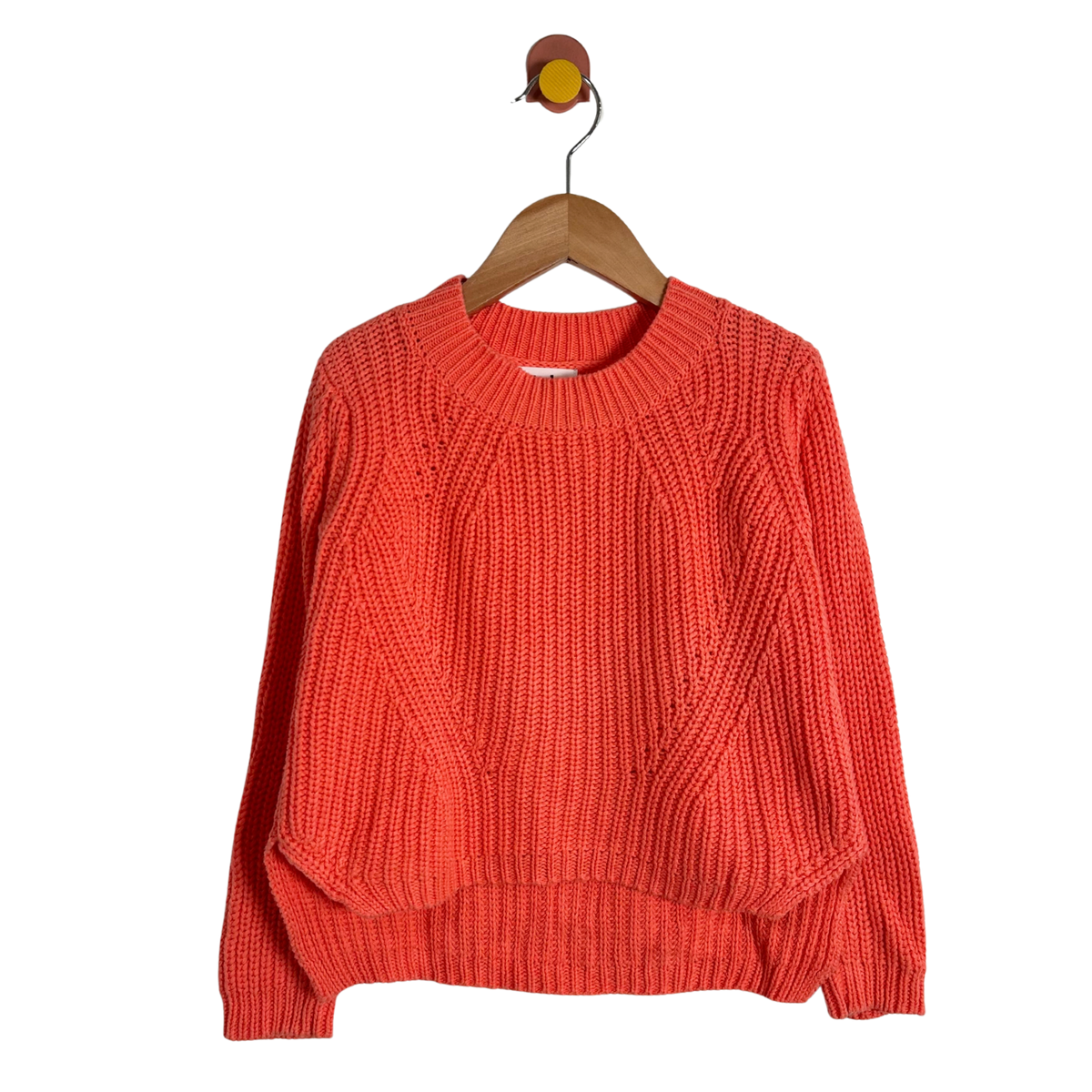 A bright coral orange chunky knit sweater with a crew neck and balloon sleeves, hanging on a wooden hanger against a plain white background.