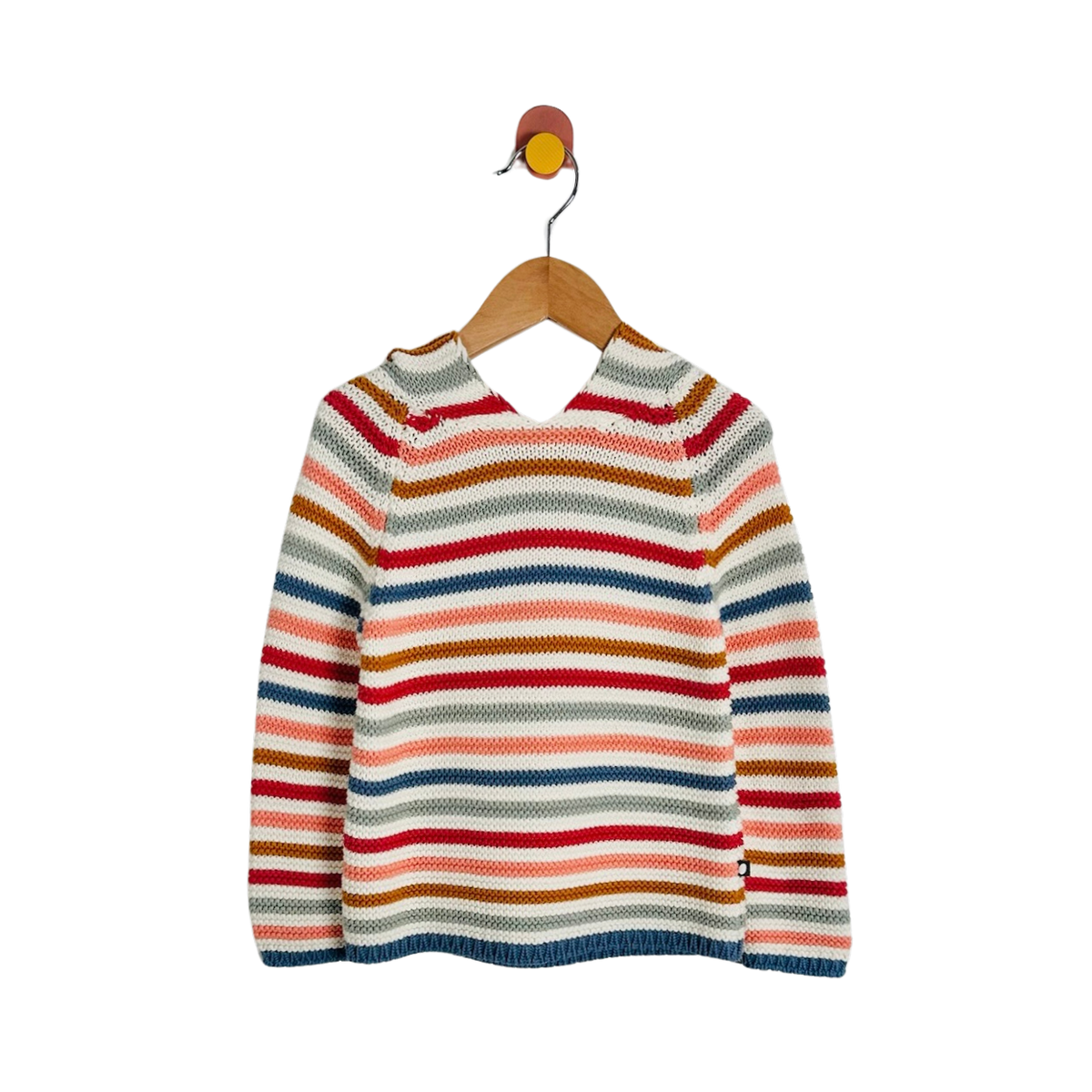 A children's knit sweater with horizontal stripes in red, orange, brown, blue, pink, and cream, hanging on a wooden hanger against a plain white background.