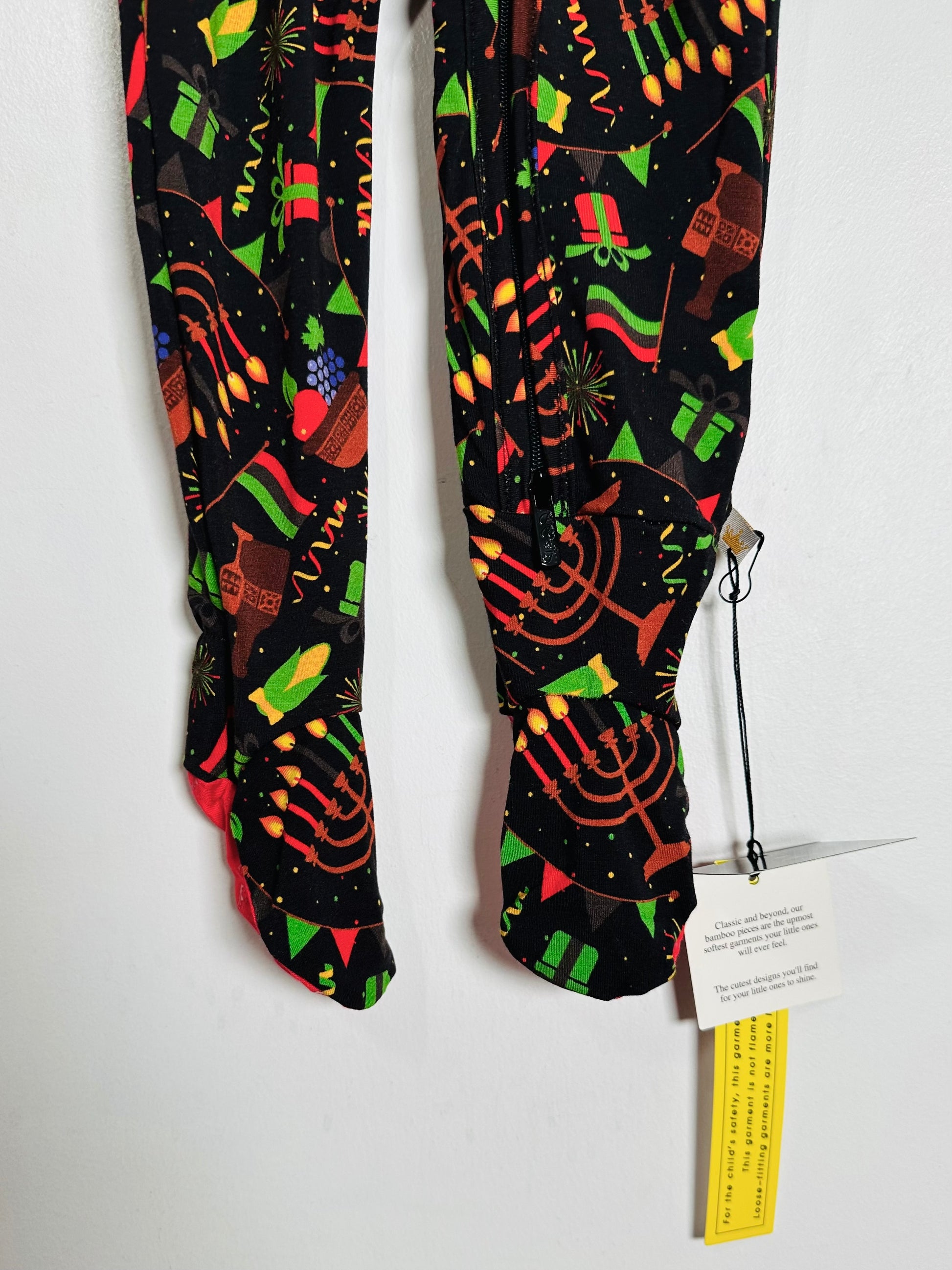 Colorful patterned leggings on a white background with a tag attached.