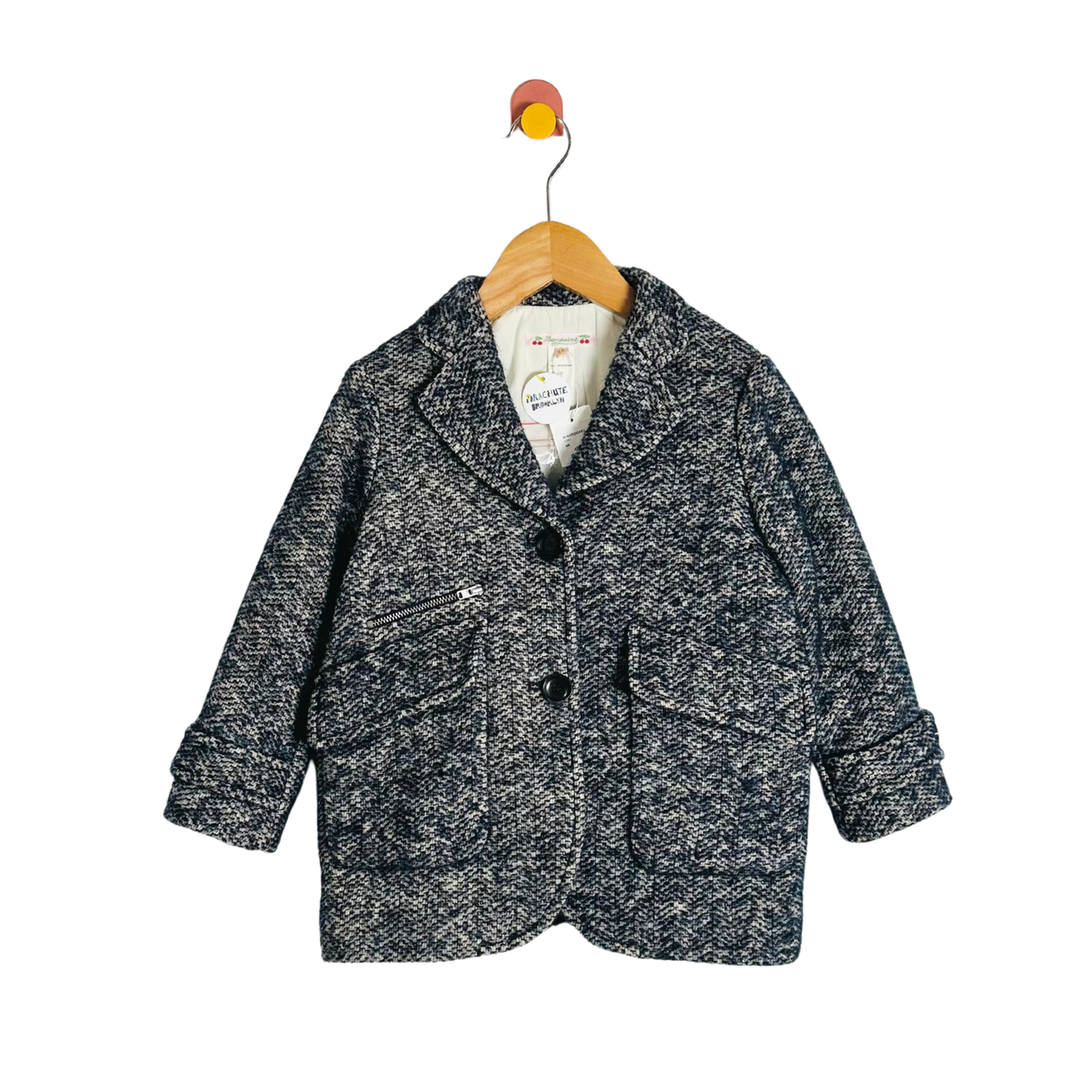 Children's gray textured coat on a hanger with a white background