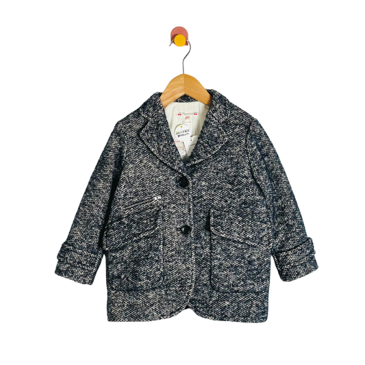Children's gray textured coat on a hanger with a white background