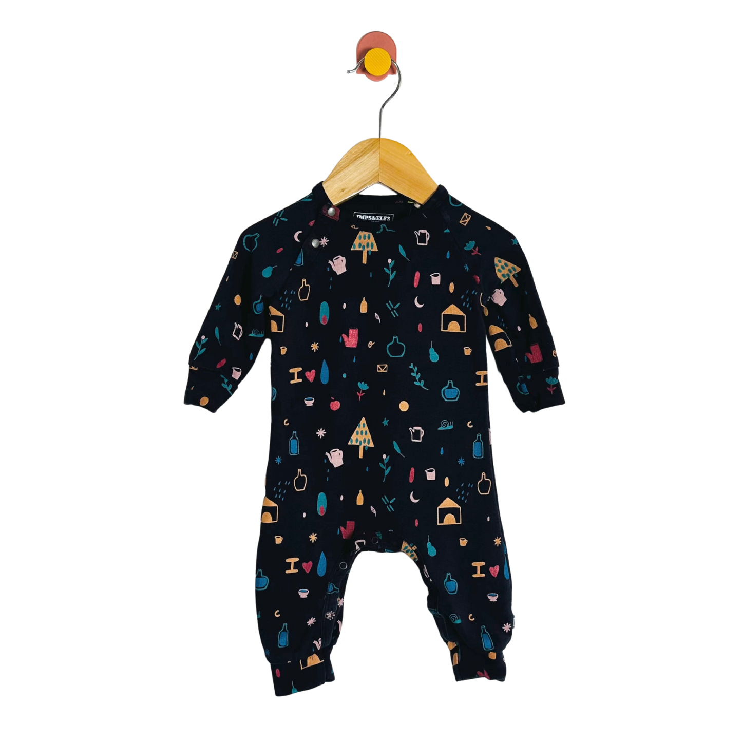 Black baby onesie with colorful patterns on a hanger against a white background