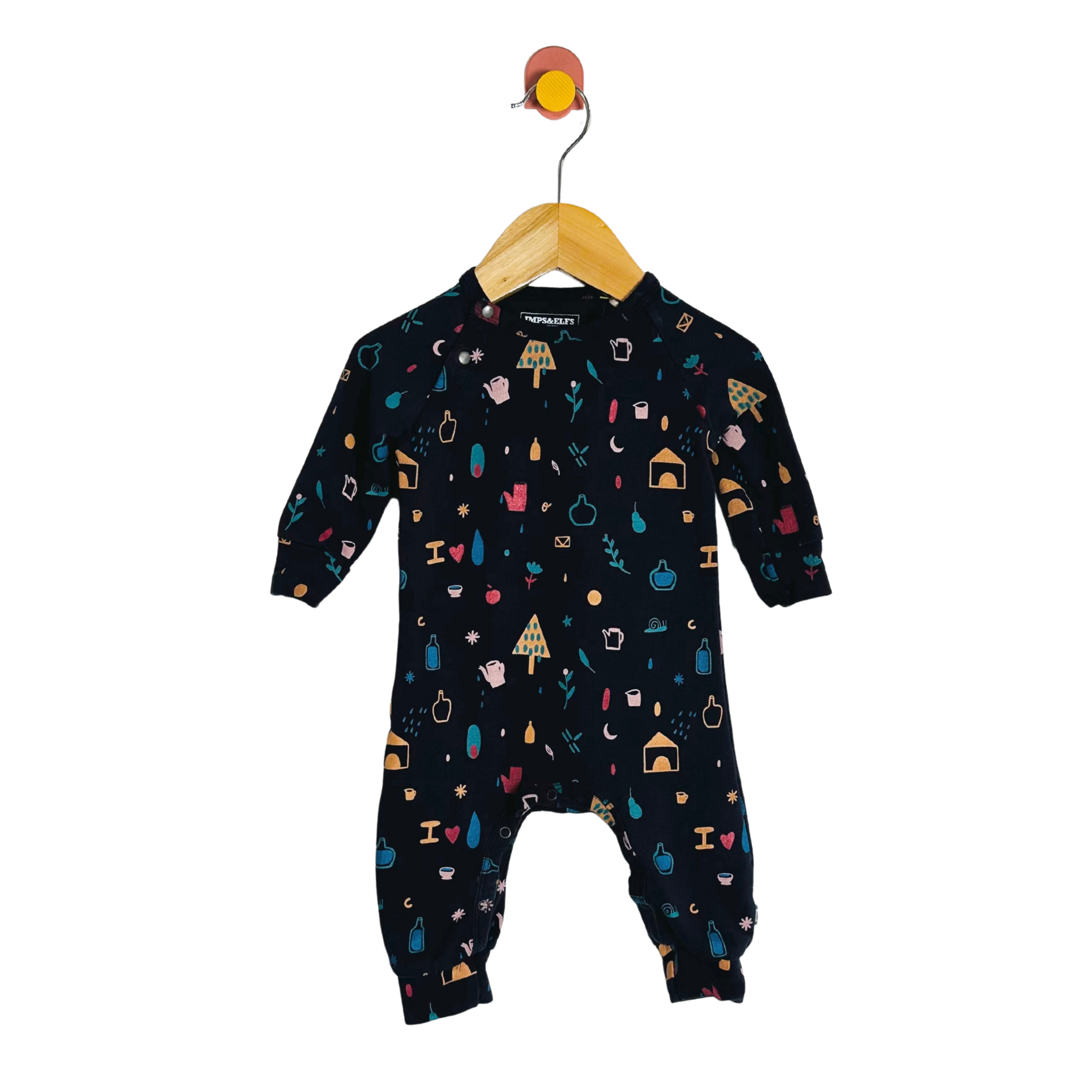 Black baby onesie with colorful patterns on a hanger against a white background
