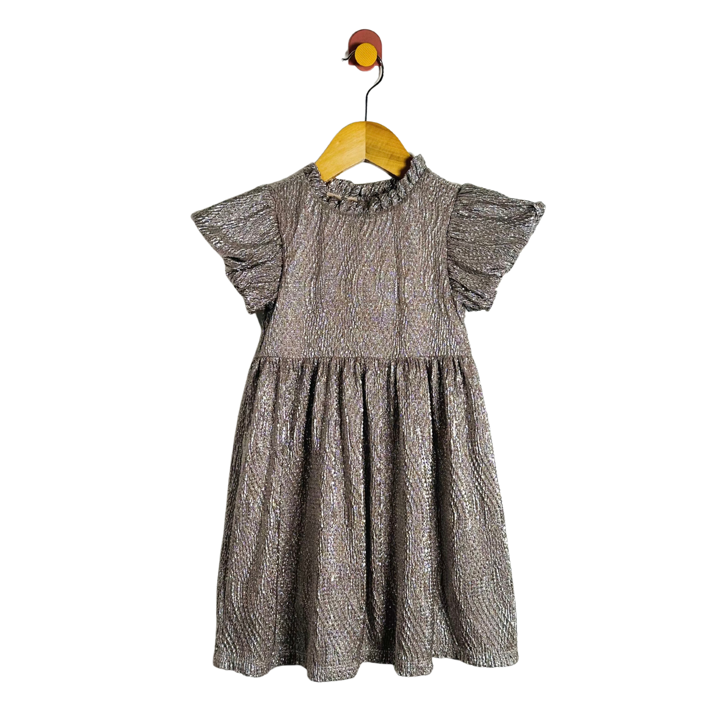 Children's dress with ruffled sleeves on a white background