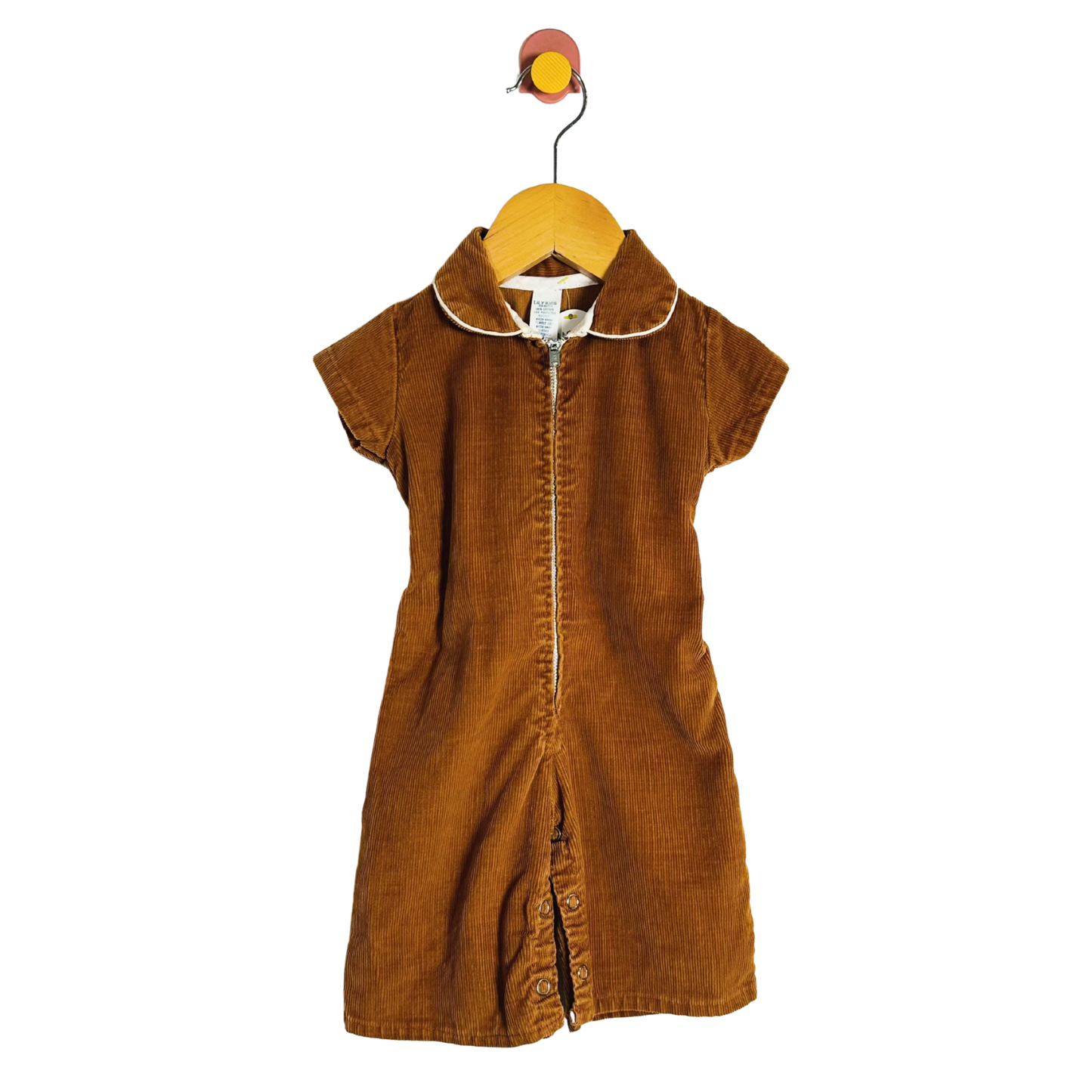 Brown dress on a hanger against a white background