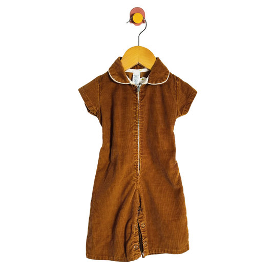 Brown dress on a hanger against a white background