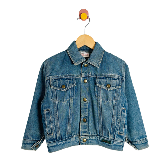Blue denim jacket on a wooden hanger against a white background