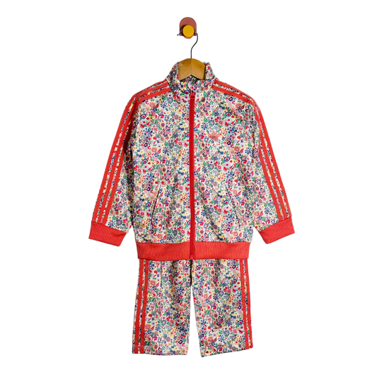 Children's floral tracksuit with red accents on a white background