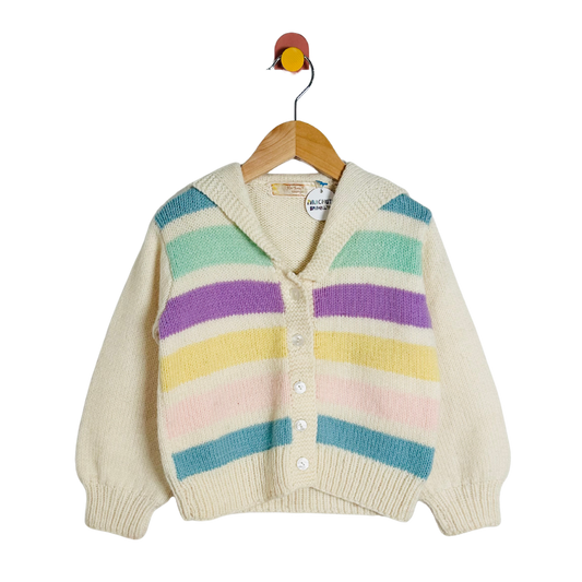 Children's cardigan with colorful stripes on a hanger against a white background