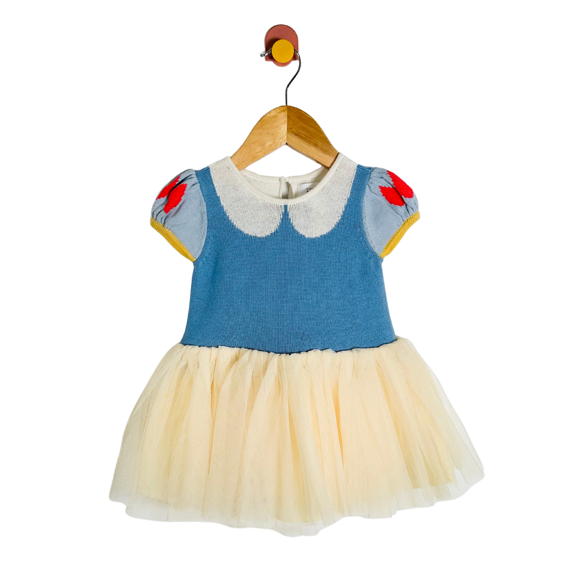 Children's dress with blue bodice and tulle skirt on a hanger against a white background