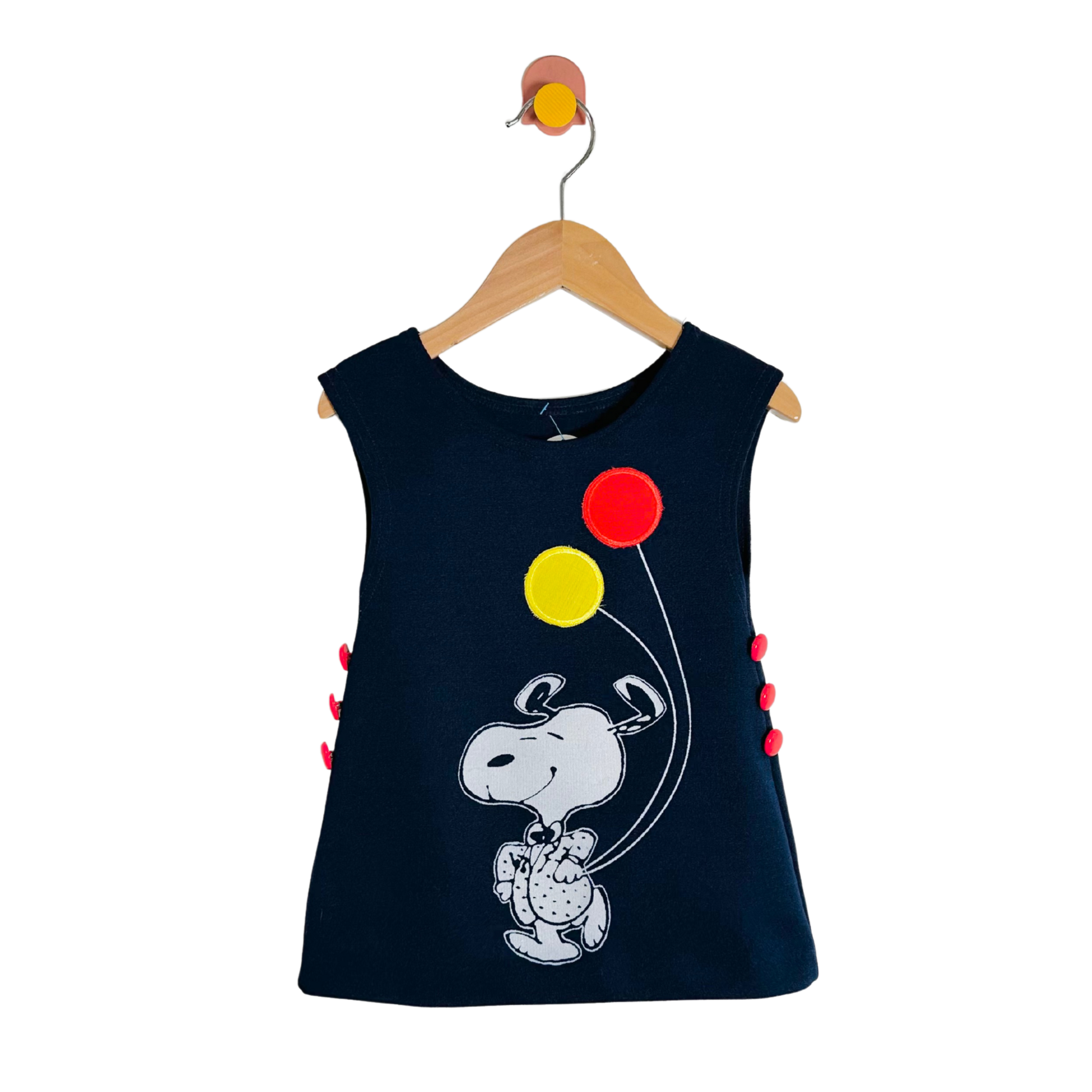 Black sleeveless dress with cartoon design and colorful balloons on a white background