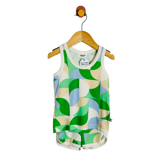 Children's tank top with geometric pattern on a wooden hanger against a white background