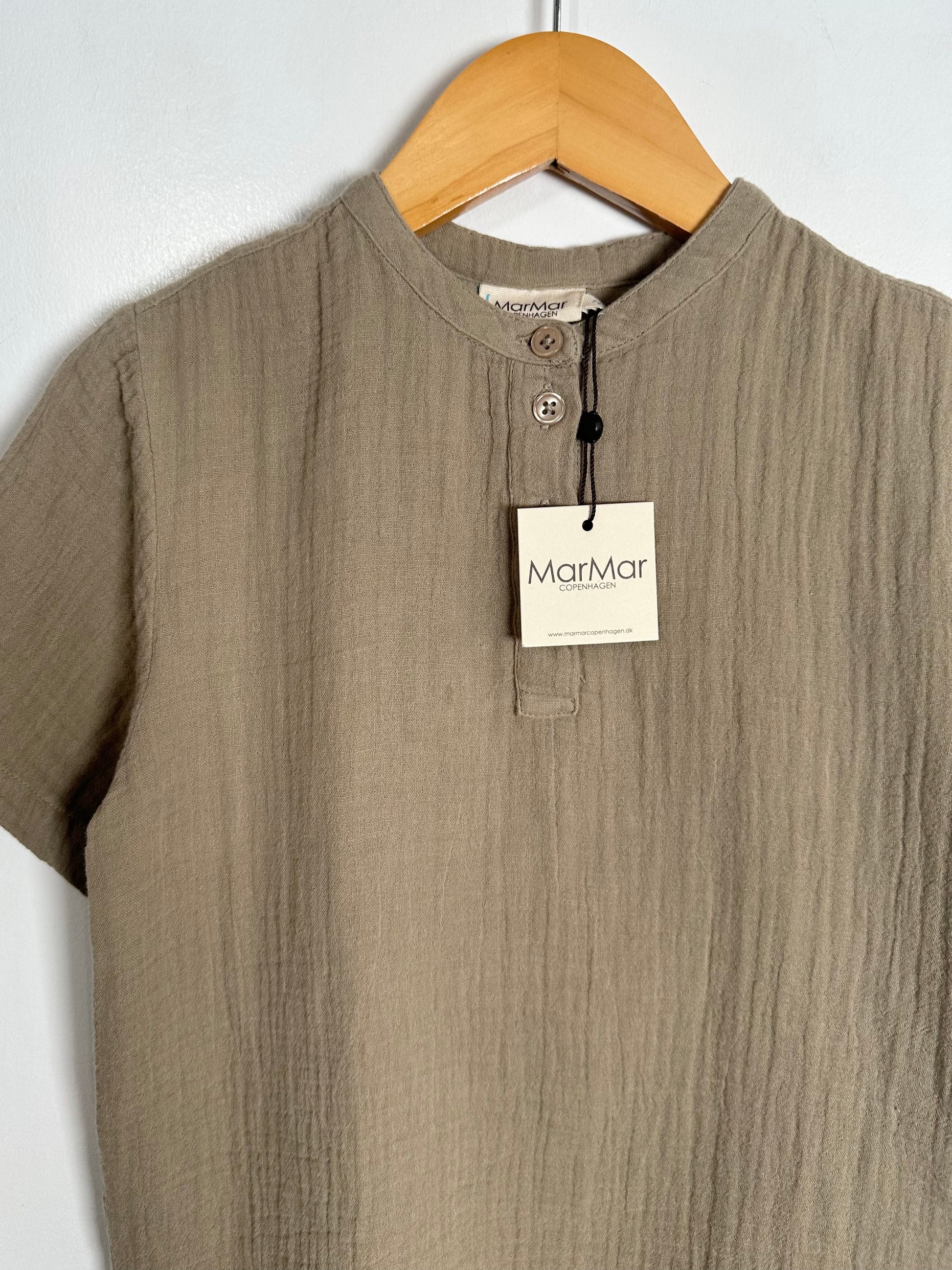 Brown shirt on a hanger with a 'MarMar' tag