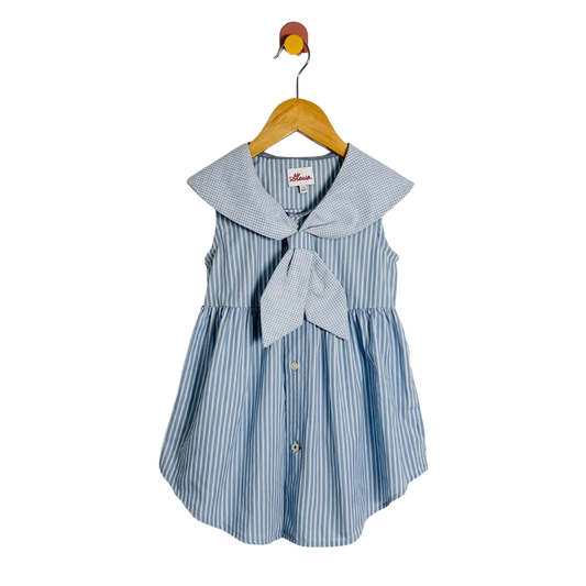 Blue and white striped dress with a bow on a wooden hanger against a white background