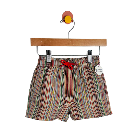 Striped shorts with a red drawstring on a hanger against a white background