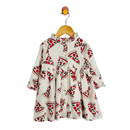 Children's dress with pizza pattern on a hanger against a white background