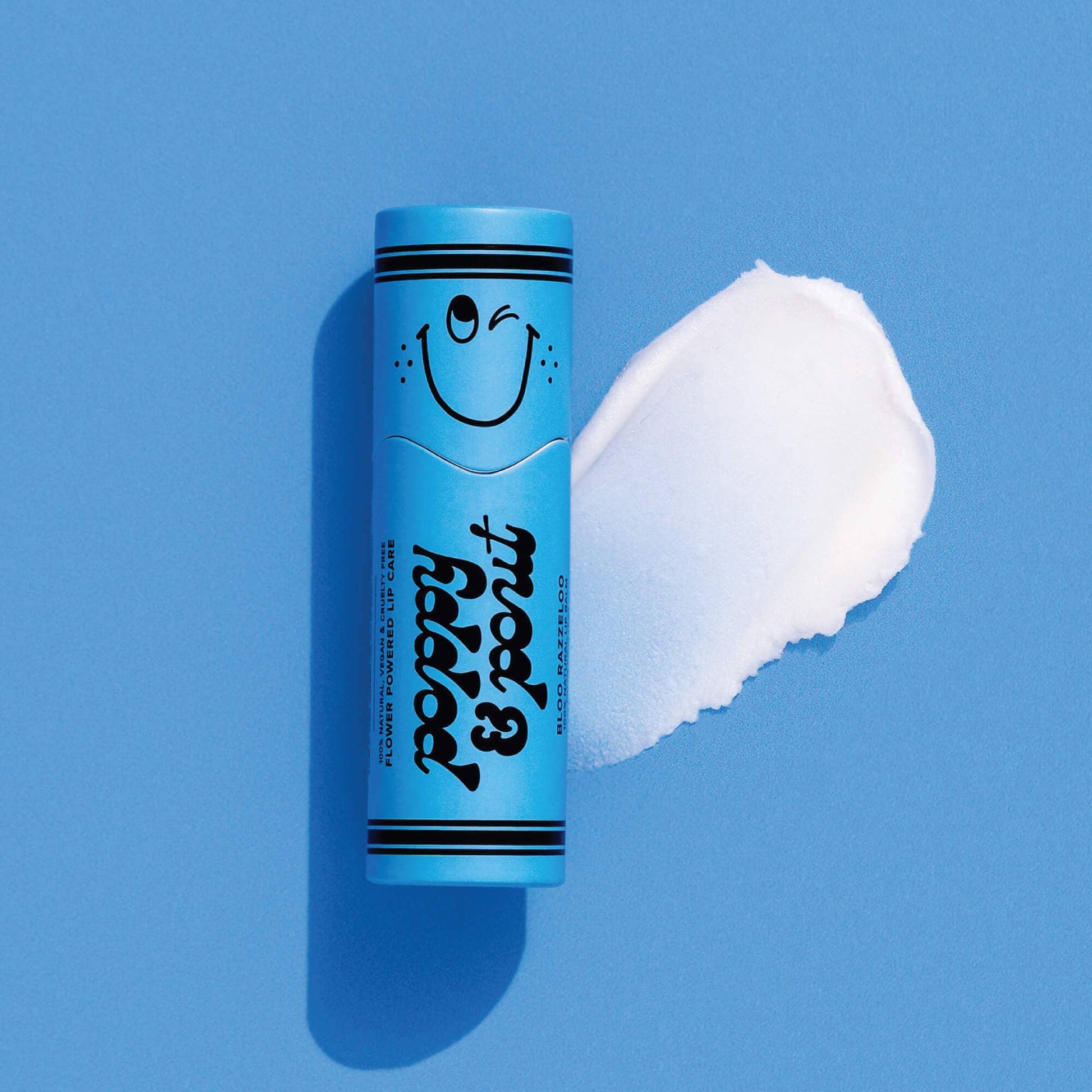 Blue tube of Mole & Hyde cream with a smiley face on a blue background