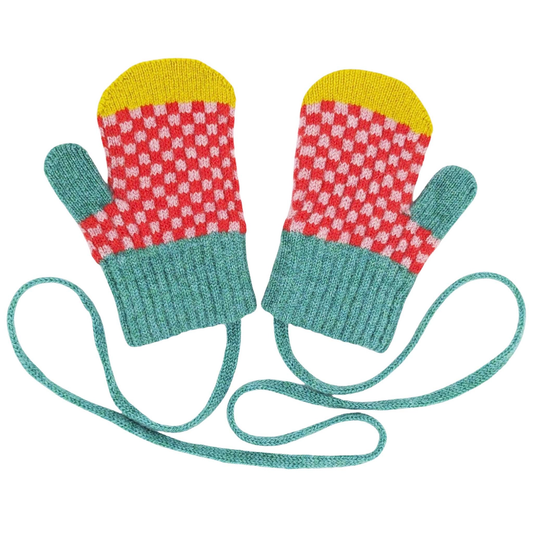 Pair of colorful knitted mittens with a strap on a white background