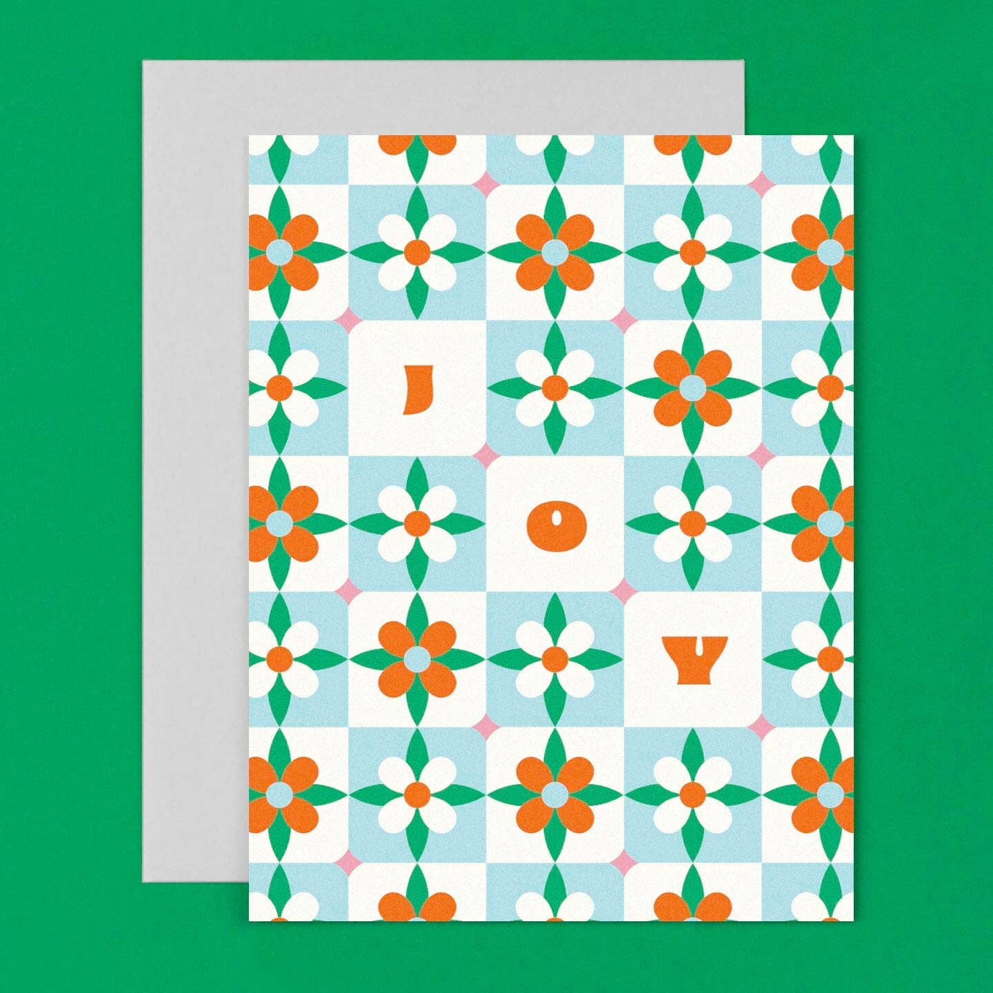 Greeting card with floral pattern and letters on a green background