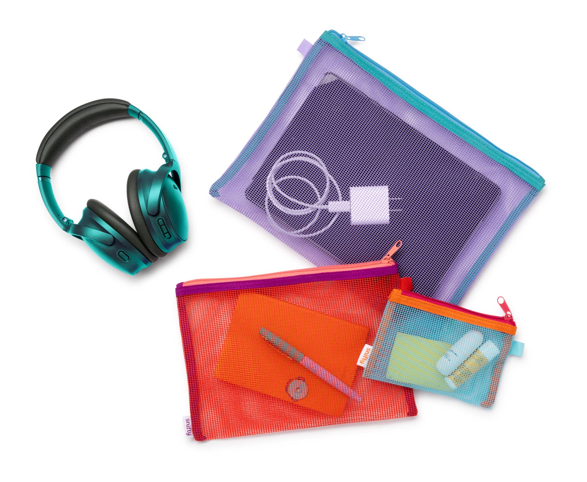 Colorful pouches with a pair of headphones on a white background