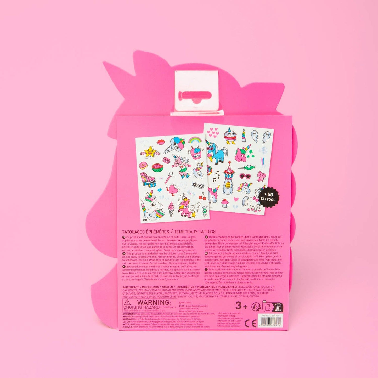 Pink packaging with cartoon character and temporary tattoos on a pink background