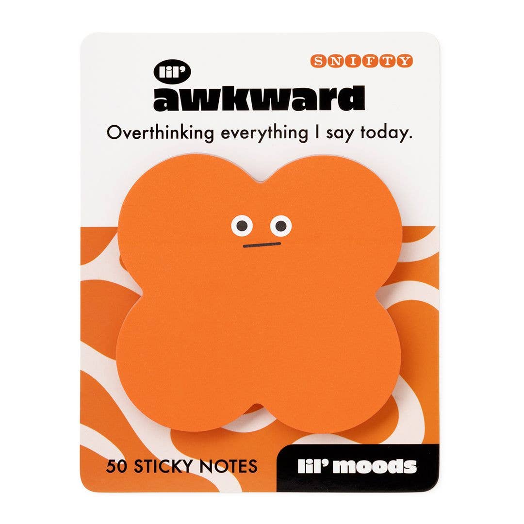 An orange four-lobed sticky note with a simple face, mounted on a white and orange card labeled 'lil' awkward' and '50 STICKY NOTES' by 'lil' moods'.