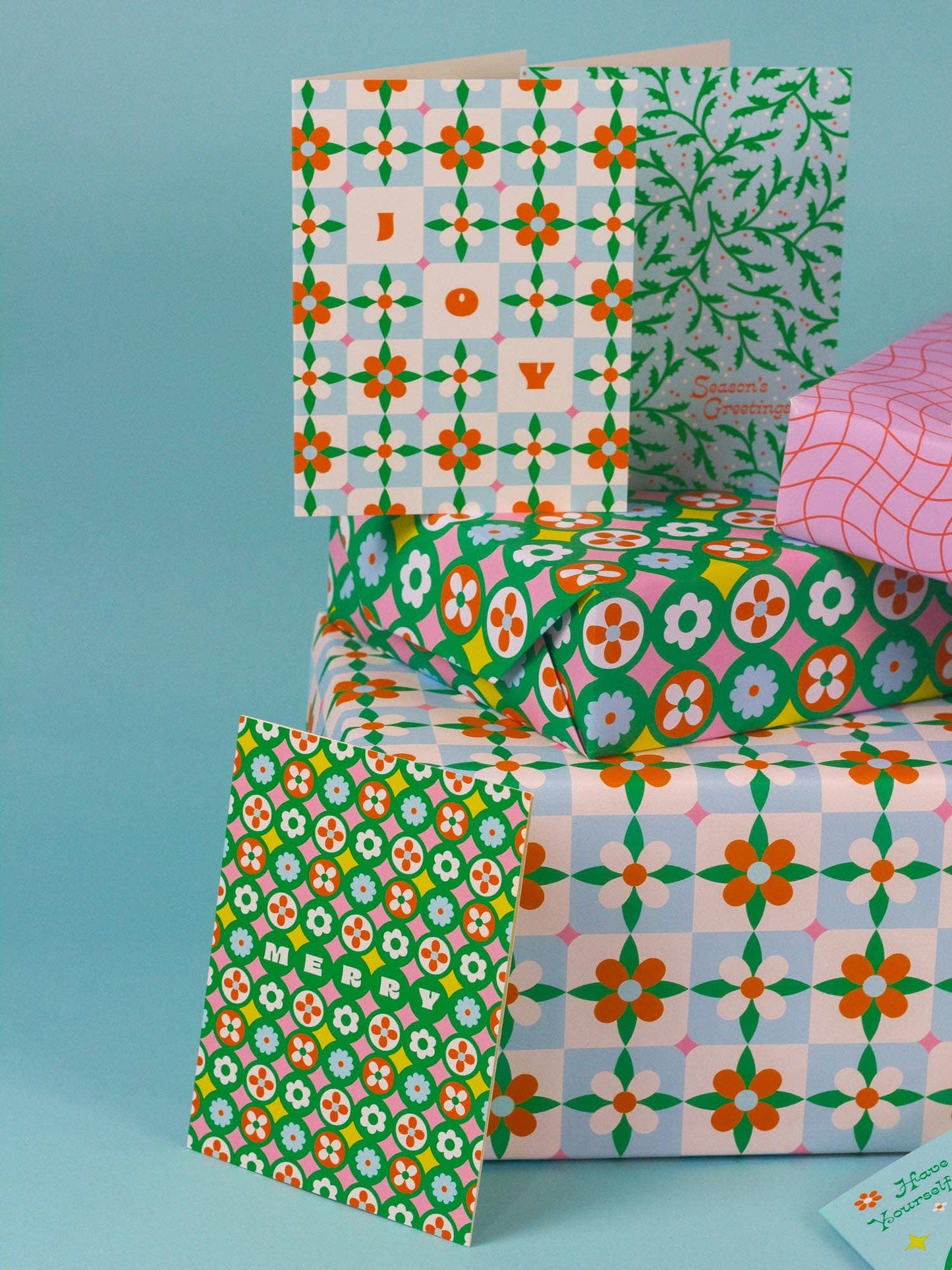 Collection of patterned cards on a blue background