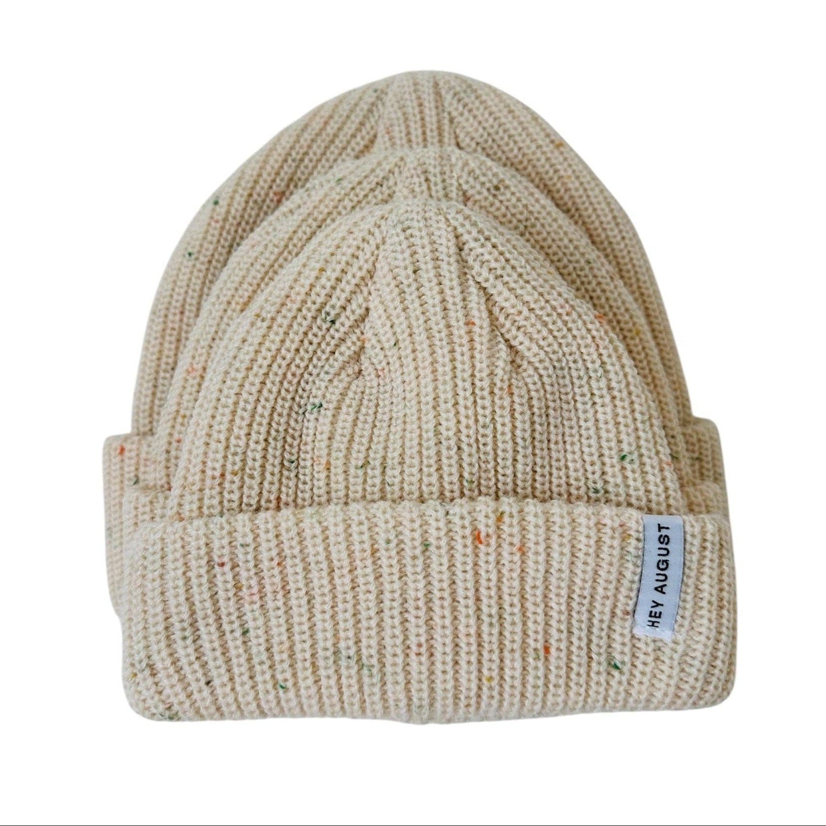 Beige knit beanie with a brand label on a white background
