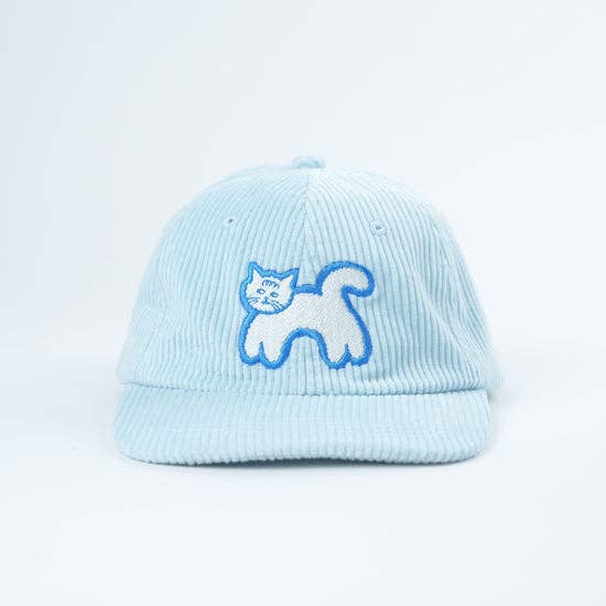Light blue cap with a cat design on a light gray background