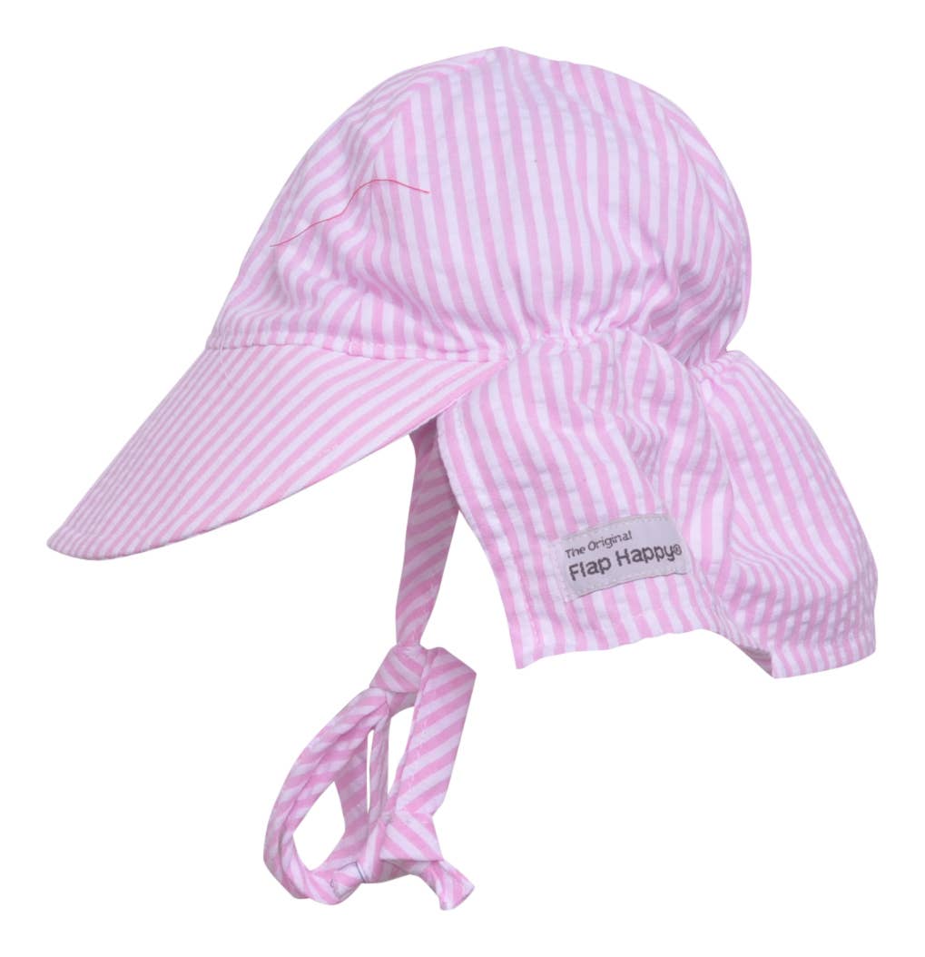 Pink and white striped sun hat with a flap on a white background