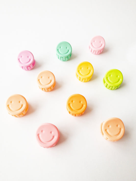 kids assortment of happy little smiley face hair claws